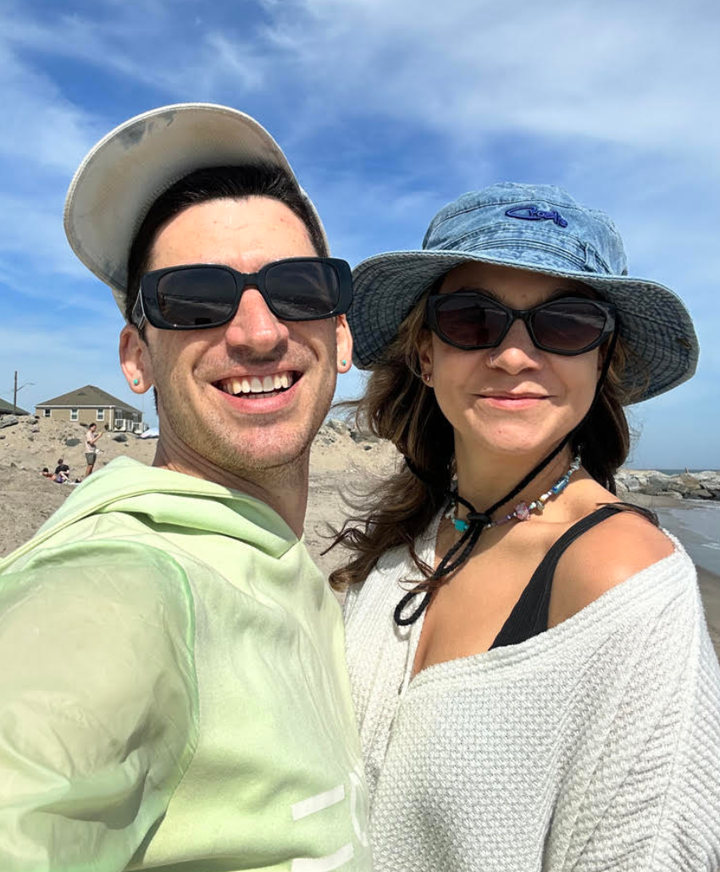 The author and Adam at Jacob Riis Beach in Queens, New York, in 2023 — 15 years after prom night.