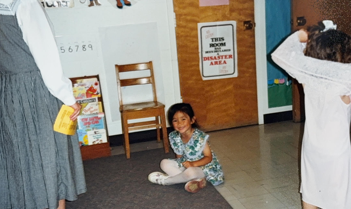 The author, age 4 (1999), in her preschool classroom.