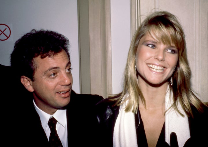 Billy Joel and then-girlfriend Christie Brinkley attend an art exhibit in New York on August 9, 1984.