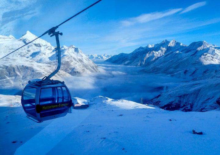 An empty gondola goes up in Zermatt, Switzerland.