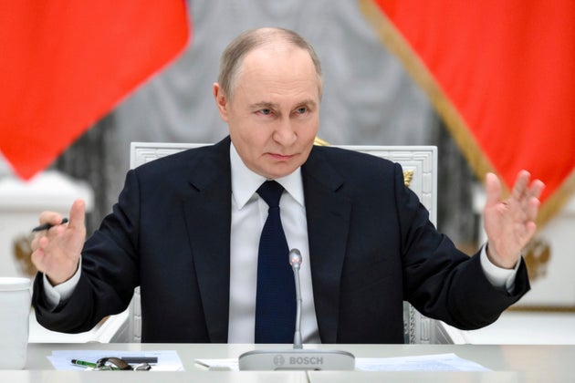 Russian President Vladimir Putin holds a meeting with members of Russia's business community at the Kremlin in Moscow, Russia, Monday, May 26, 2025.