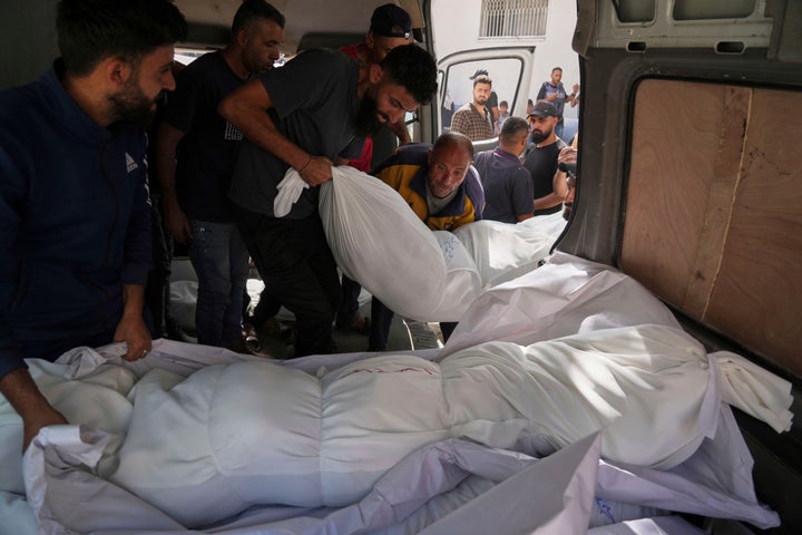 Israeli Strikes Kill 52 In Gaza Together with Dozens In A Shelter, Medics Say 1 Bodies of Palestinians killed in the Israeli army airstrikes are brought to Al-Shifa Hospital in Gaza City, Monday, May 26, 2025. (AP Photo/Jehad Alshrafi)