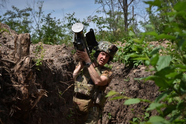 A Ukrainian serviceman carries a US Stinger air-defense missile launcher on the front line in the Zaporizhzhia region of Ukraine, on Tuesday, May 28, 2024. 