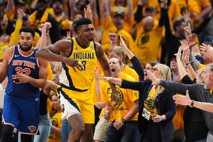 Indiana Pacers center Thomas Bryant (3) celebrates after making a 3-pointer during the second half of Game 6 of the Eastern Conference finals of the NBA basketball playoffs against the New York Knicks in Indianapolis, Saturday, May 31, 2025. (AP Photo/Michael Conroy)