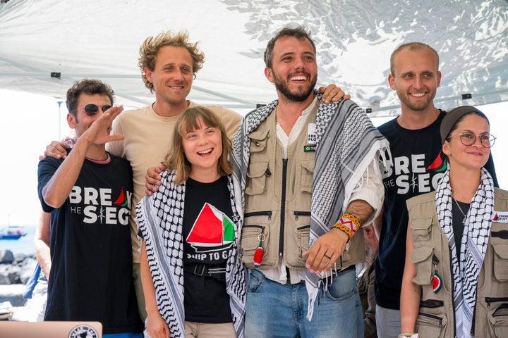 Greta Thunberg with part of the crew of the ship Madleen, shortly before they depart for Gaza, in San Giovanni Li Cuti on Sunday in Catania, Italy. Thunberg is among those who will attempt to sail to Gaza on a boat organized by the Freedom Flotilla Coalition (FFC), in a bid to break Israel's blockade of the Palestinian territory.