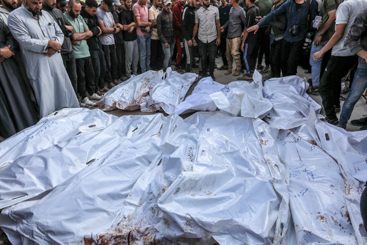 Loved ones mourn over the bodies of Palestinians who were killed by Israeli forces at an aid distribution point in the Al-Alam area of Rafah, at Nasser Hospital in Khan Younis, Gaza on June 3, 2025.