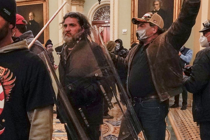 Dominic Pezzola is seen in the Capitol with a police shield on Jan. 6, 2021.