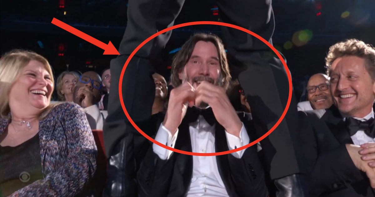 Keanu Reeves' Reaction To Jonathan Groff Caressing Him Has The Internet Screaming