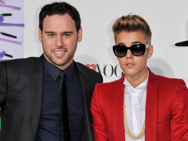 Scooter Braun dan Justin Bieber pada tahun 2013