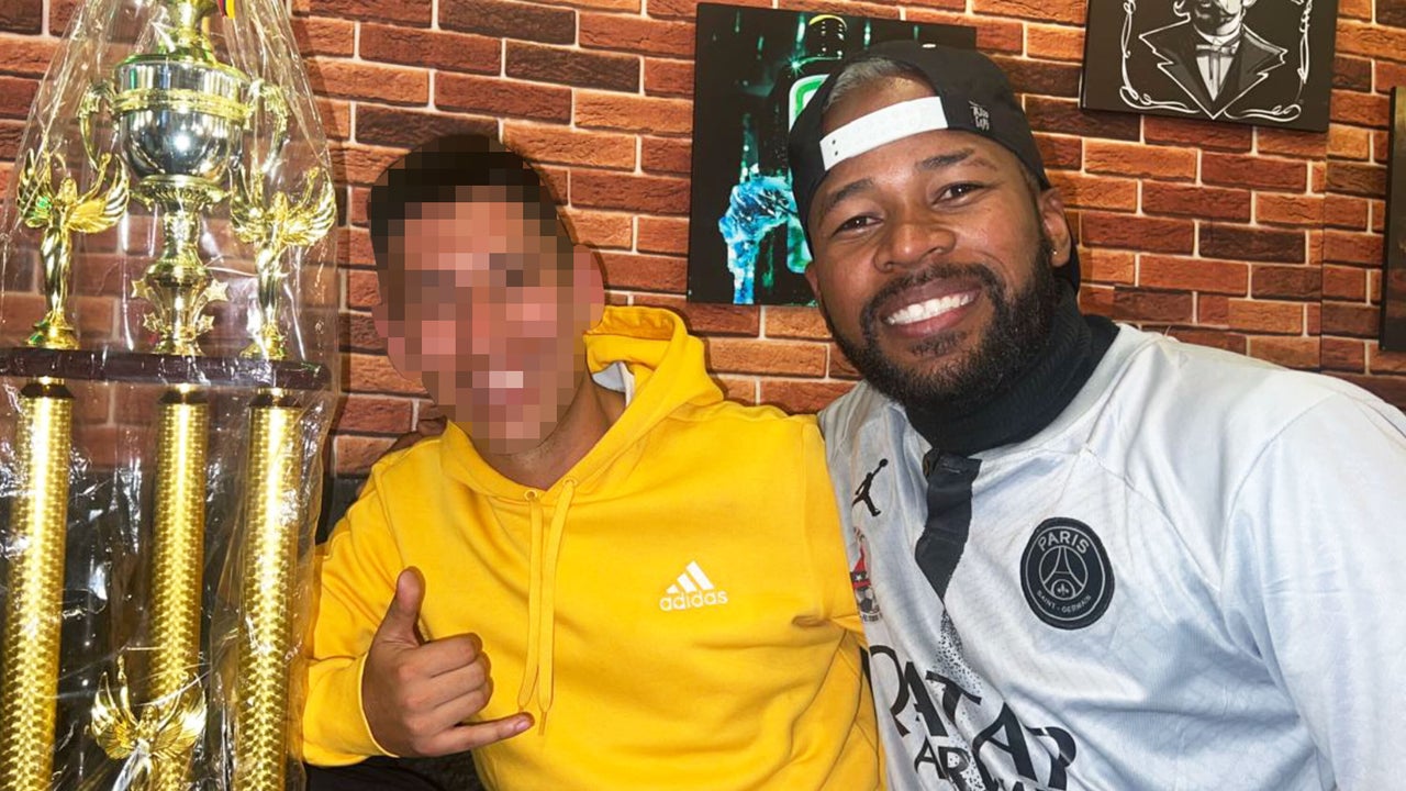 Immigration officials accused Reyes Barrios, right, of being a Tren de Aragua gang member, citing his soccer tattoo and a common hand gesture he made.