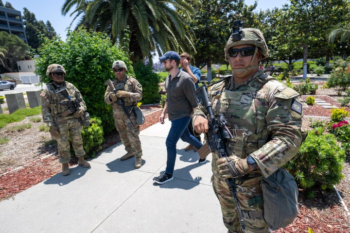 Members of the California National Guard stand watch at the West Los Angeles Federal Building on Tuesday, June 10, 2025.