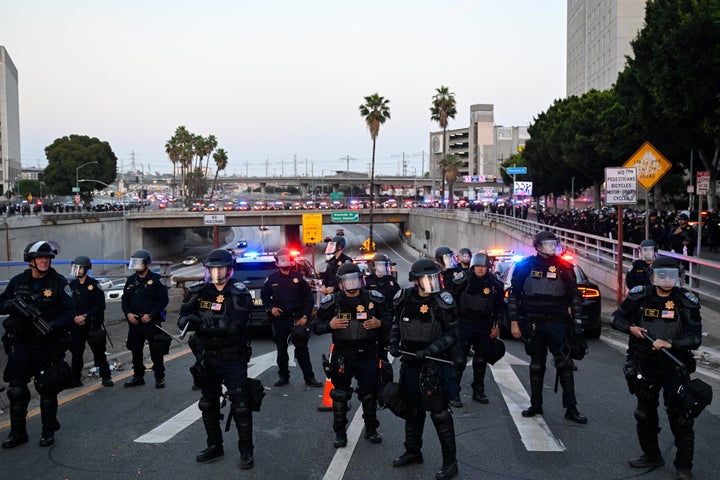 California Highway Patrol officers and police are seen as curfew went into effect after mass anti-ICE protest in Los Angeles, California on June 10, 2025 amid protests over immigration raids.