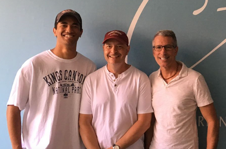 Pete Mercurio (center), Danny Stewart (right) and their son in 2018.