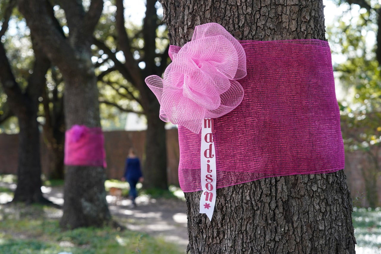 Pink bows were left on trees in Houston in honor of Madison's memory.