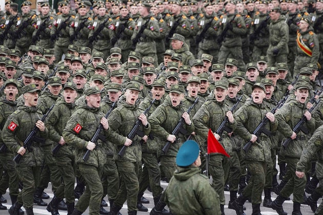 Troops march during a rehearsal for the Victory Day military parade, which will take place at Dvortsovaya (Palace) Square on May 9