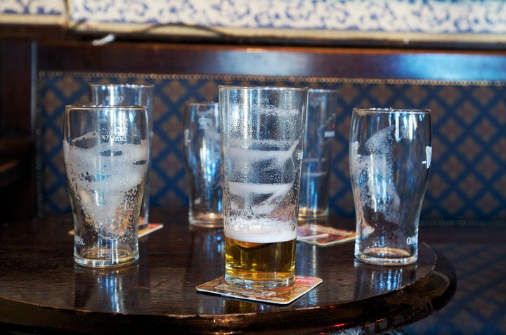 Bubbles that stick to the glass as it empties, seen here, are actually a good thing. It's called lacing.