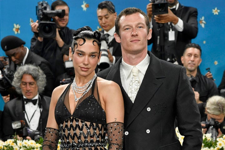 Dua Lipa is shown with his fiance, Callum Turner. 