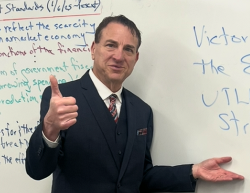 The author teaching in June 2025.