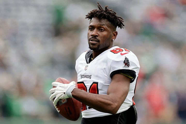 Antonio Brown walks on the field before his final NFL game against the New York Jets on Jan. 2, 2022.