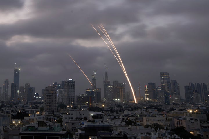 Israeli Iron Dome air defense system fires to intercept projectiles over Tel Aviv, Saturday, June 14, 2025. (AP Photo/Leo Correa)