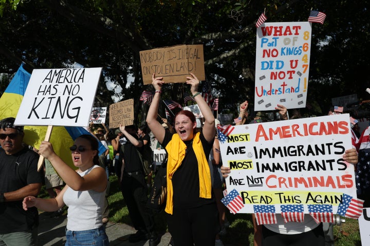 Protesters prepare to march near President Donald Trump's Mar-a-Lago home during a "No Kings Day" protest on June 14, 2025 in West Palm Beach, Florida.