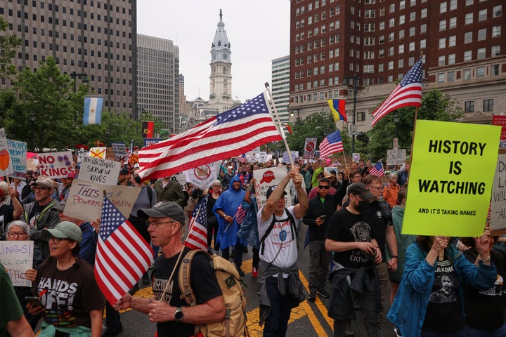 Anti-Trump Demonstrators Crowd Streets, Parks And Plazas Throughout The U.S. Organizers Say Tens of millions Got here. 5 Demonstrators march during the "No Kings" protest, Saturday, June 14, 2025, in Philadelphia.