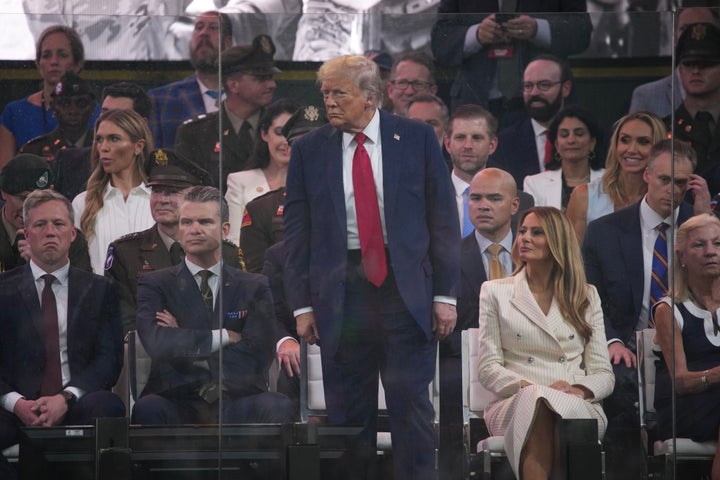 WASHINGTON, DC - JUNE 14:U.S. President Donald Trump, First Lady Melania Trump, and Defense Secretary Pete Hegseth along with other guests watch as members of the U.S Army participate in the 250th birthday parade of the U.S. Army June 14, 2025 in Washington, DC. The U.S. Army is marking its 250th birthday with a military parade including roughly 6,600 troops, 150 vehicles, and over 50 aircraft. The parade, which coincides with President Donald Trump's 79th birthday, is designed to tell the history of the U.S. Army.