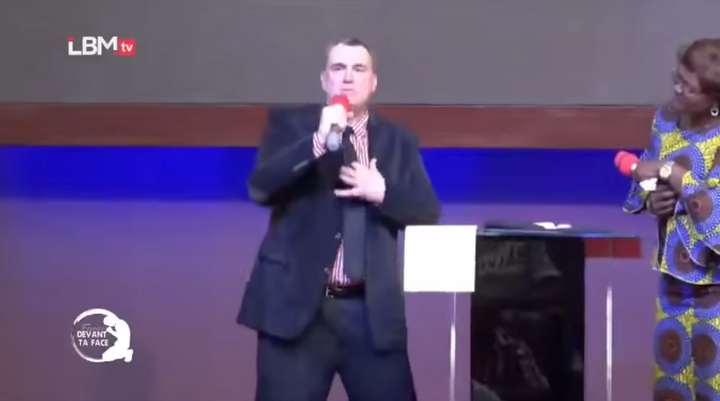 Vance Boelter preaching at a church service in Africa.