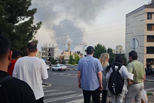 TEHRAN, IRAN - JUNE 16: Smoke rises after a reported Israeli strike on a building used by Islamic Republic of Iran News Network, part of Iran's state TV broadcaster, on June 16, 2025 in Tehran, Iran. Over recent days, Iran has been hit by a series of Israeli airstrikes targeting military and nuclear sites, as well as top military officials, and launched its own counterattack on Israel. (Photo by Stringer/Getty Images)