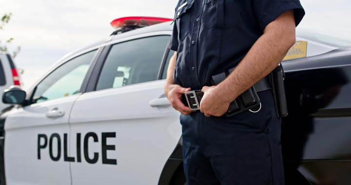 Sometimes impersonators will slap a magnet to the side of a car, but the "police" decal should be flush with the paint job on the car.