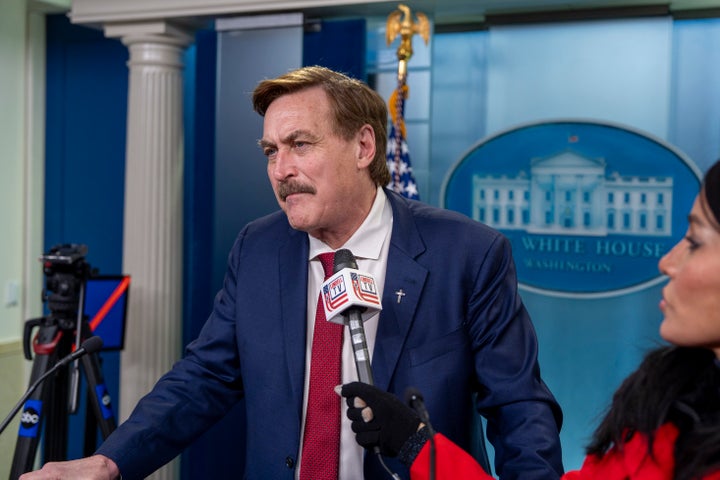Mike Lindell listens during an interview from the podium in the press briefing room of the White House, Friday, Feb. 21, 2025, in Washington.