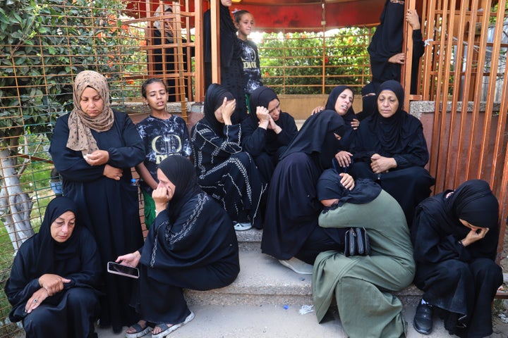 Palestinian women mourn their relatives who were killed in an Israeli strike, at Nasser Hospital in Khan Younis, Gaza, on June 17, 2025.