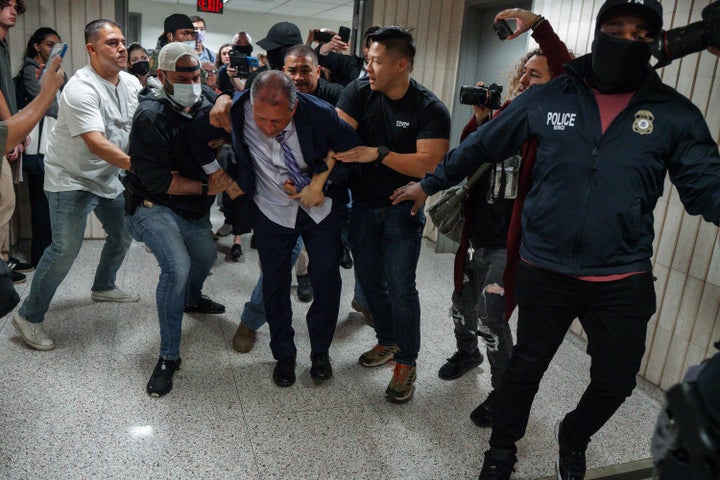 Immigration and Customs Enforcement and FBI agents forcibly detain New York City Comptroller Brad Lander outside federal immigration court on June 17, 2025, in New York.