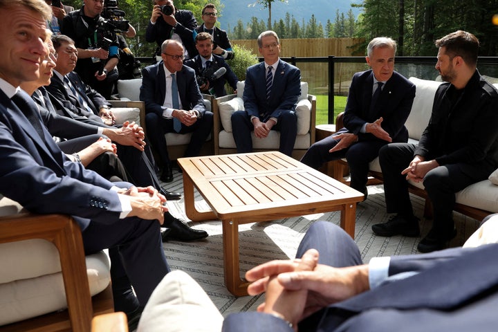 Canadian Prime Minister Mark Carney, 2nd right, Ukrainian President Volodymyr Zelenskyy, right, U.S. Treasury Secretary Scott Bessent, 3rd right, German Chancellor Friedrich Merz, 4th right, Japanese Prime Minister Shigeru Ishiba, 5th right, and French President Emmanuel Macron, left, attend a meeting during the G7 Leaders' Summit in Kananaskis, in Alberta, Canada, on June 17, 2025.