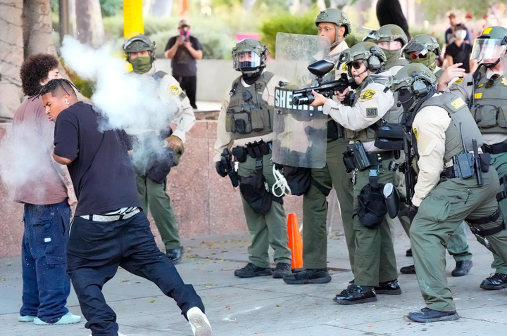 A Los Angeles County Sheriff’s deputy fires Pepper Balls at a protester on Wednesday, June 11, 2025, in Los Angeles, California.