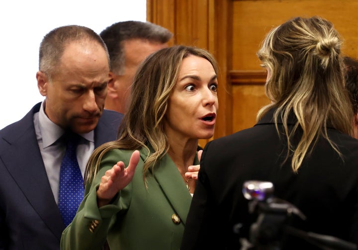 Karen Read talks with her attorneys at Norfolk Superior Court, Tuesday, June 17, 2025, in Dedham, Massachusetts.
