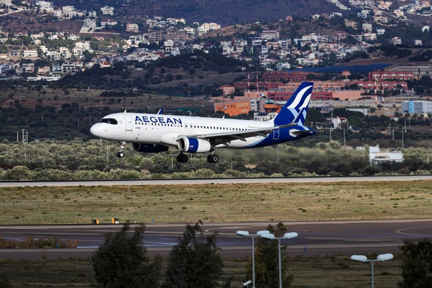 Aegean Airlines Airbus A320 passenger airplane landing at Athens International Airport ATH serving the Greek capital. The narrow body aircraft has the registration tail number SX-DGZ and is powered by 2x IAE jet engines. Aegean Airlines A3 AEE is the flag capital of Greece, using Athens as the main operating base and hub. The airline is member of Star Alliance aviation alliance group and has a fleet of 63 narrow body planes and 17 turboprop from the subsidiary airline Olympic Air. Athens, Greece on December 2024 (Photo by Nicolas Economou/NurPhoto via Getty Images)