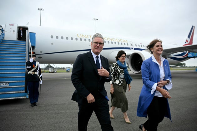 Keir Starmer arrives at Amsterdam's Schiphol Airport ahead of the NATO summit.