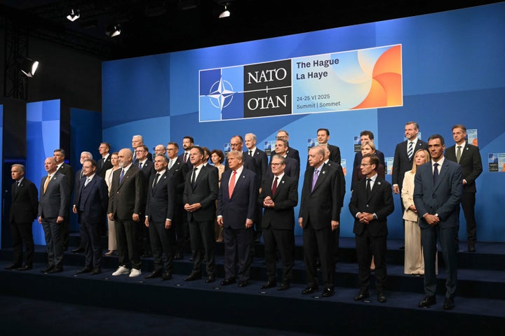 Netherlands' Prime Minister Dick Schoof, front row from fifth left, NATO Secretary General Mark Rutte, US President Donald Trump, Britain's Prime Minister Keir Starmer and Turkey's President Recep Tayyip Erdogan pose with NATO country leaders for a family photo during the NATO summit in The Hague, Netherlands, Wednesday, June 25, 2025. (Ben Stansall/Pool Photo via AP)