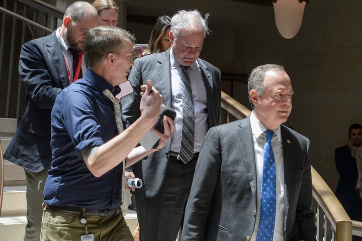 Sen. Tim Kaine (D-Va.), center, and Sen. Adam Schiff, (D-Calif.), right, arrive for a classified briefing on President Donald Trump's directed strikes on Iranian nuclear facilities last weekend, at the Capitol in Washington, D.C., on Thursday.
