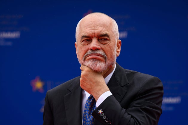 Albanian Prime Minister Edi Rama awaits the first arrivals at the beginning of the 6th European Political Community summit Friday, May 16, 2025 in Tirana, Albania. (Leon Neal/Pool via AP)