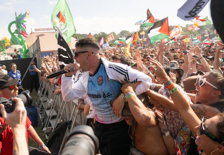 Kneecap Swarn Moglai Bap fans during the group's Glastonbury set. The biggest music festival in Great Britain regularly attracts more than 200,000 music fans.
