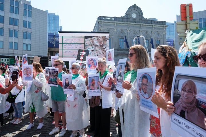 Protesters call on Israel to immediately and unconditionally end its attacks on Gaza's health infrastructure and personnel, and to allow the free and safe movement of humanitarian aid in front of European Parliament on June 19, 2025, in Brussels.