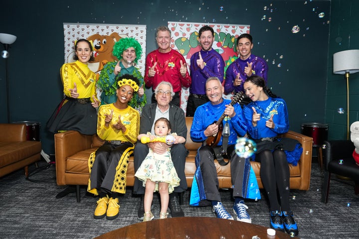 Robert De Niro and Gia have a lot of space for Wiggles in a photo before the concert. 