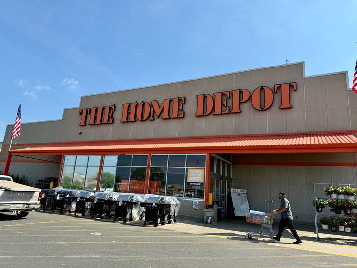 Immigrant advocates gathered at the Home Depot in Washington, D.C., one of dozens of "know your rights" meetings around the country on Tuesday.
