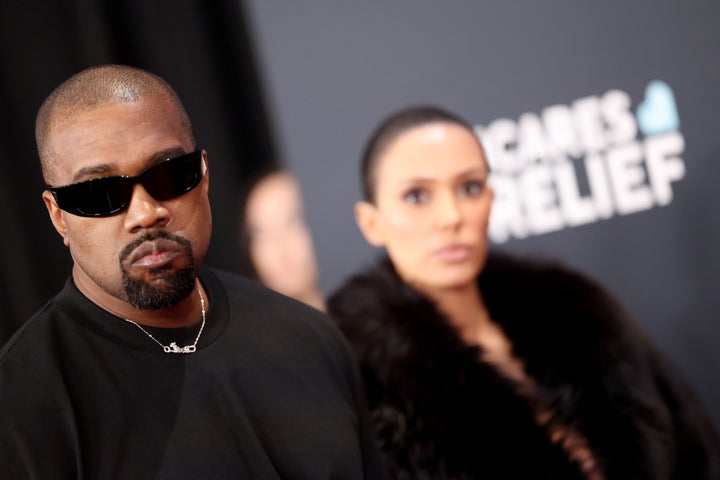 Kanye West, here with his partner Bianca Censori at the Grammy 2025 awards, has canceled his Australian visa for a song entitled 