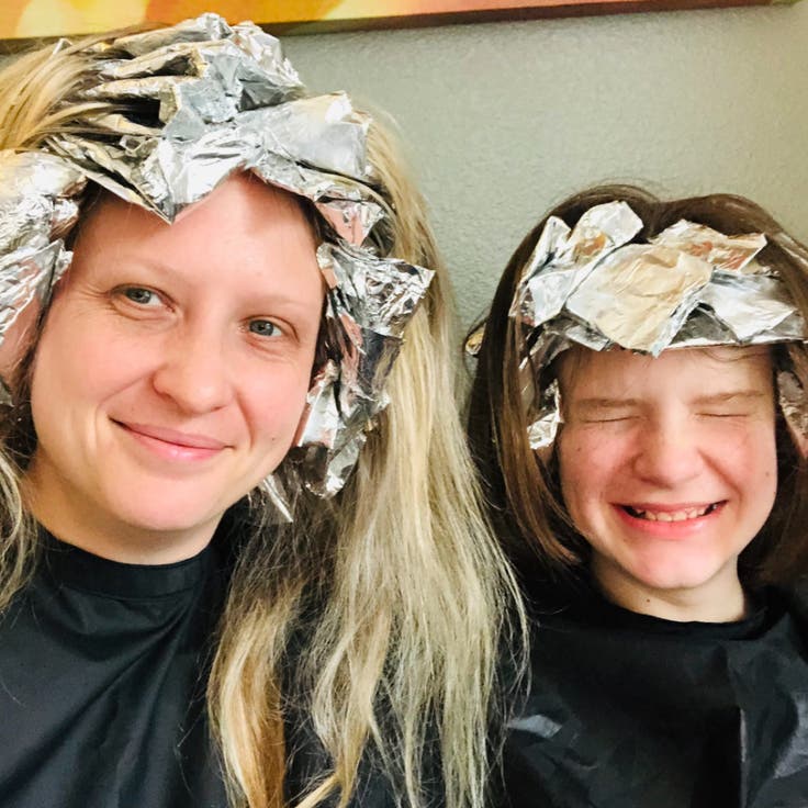 Author Asha Dore at the salon with her son, Nico.