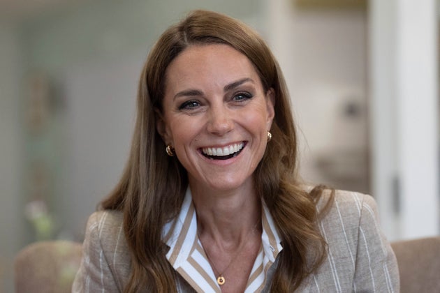 Britain's Kate, Princess of Wales, smiles during a visit to the RHS's Wellbeing Garden at Colchester Hospital in Essex