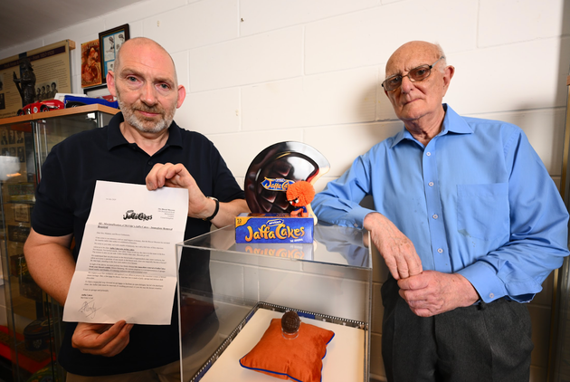 Biscuit Museum curators with the offending letter