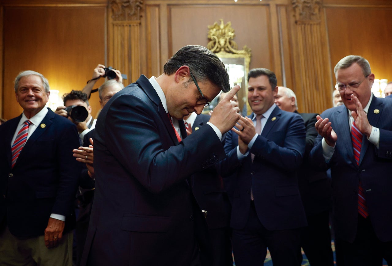 House Speaker Mike Johnson (R-La.) celebrates after passing a budget bill that will cause millions of Americans to lose health care and food benefits while handing billions to the rich.